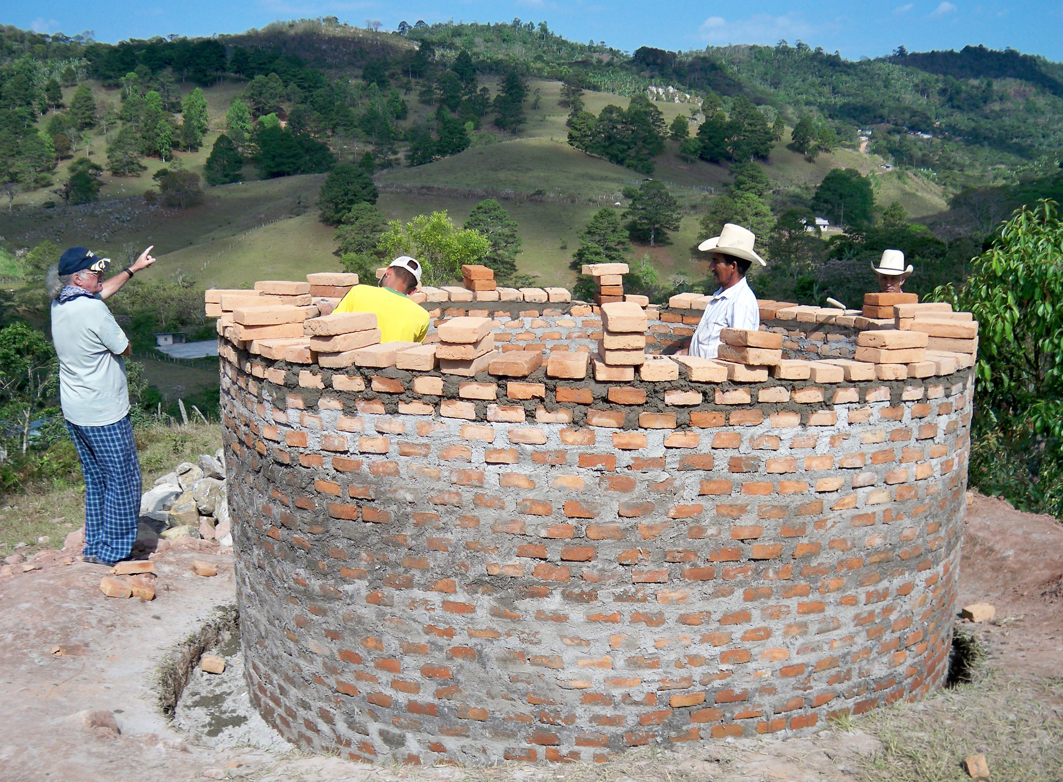 Francis Seivert discusses the progress of the water tank